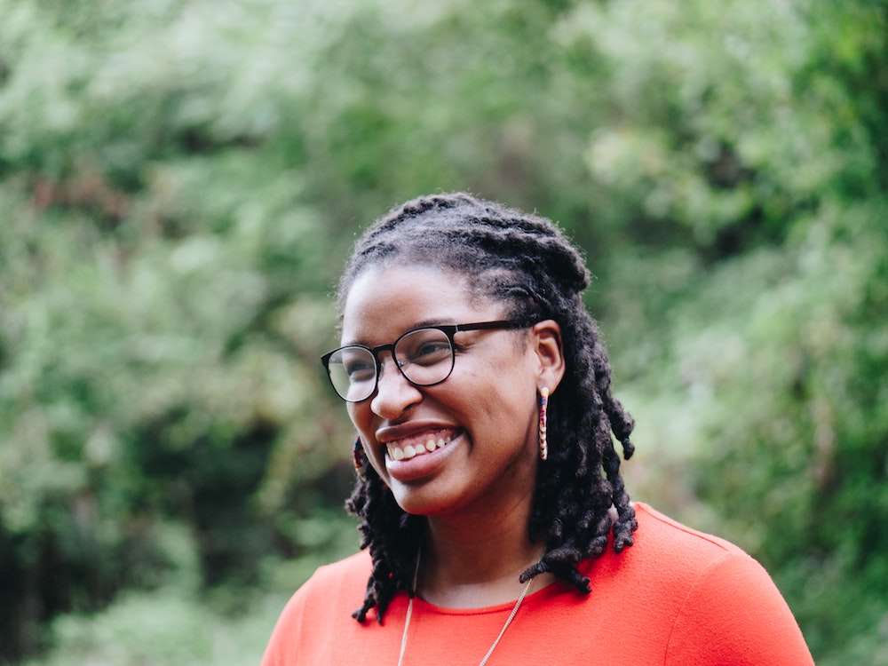 Women with glasses and braids