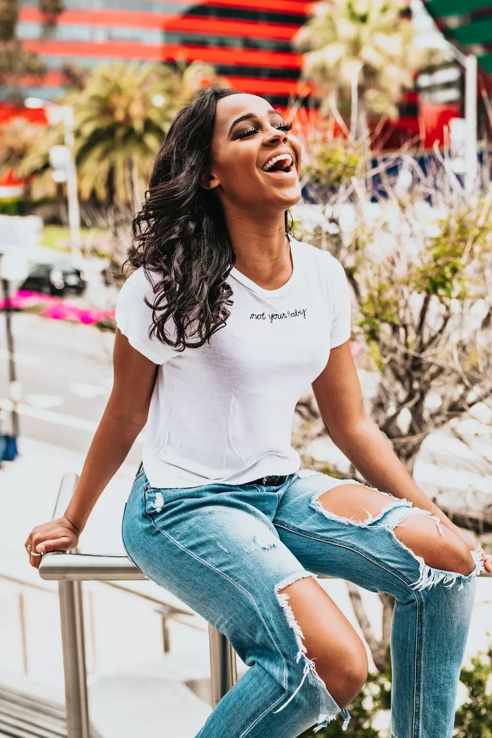 Women laughing and sitting