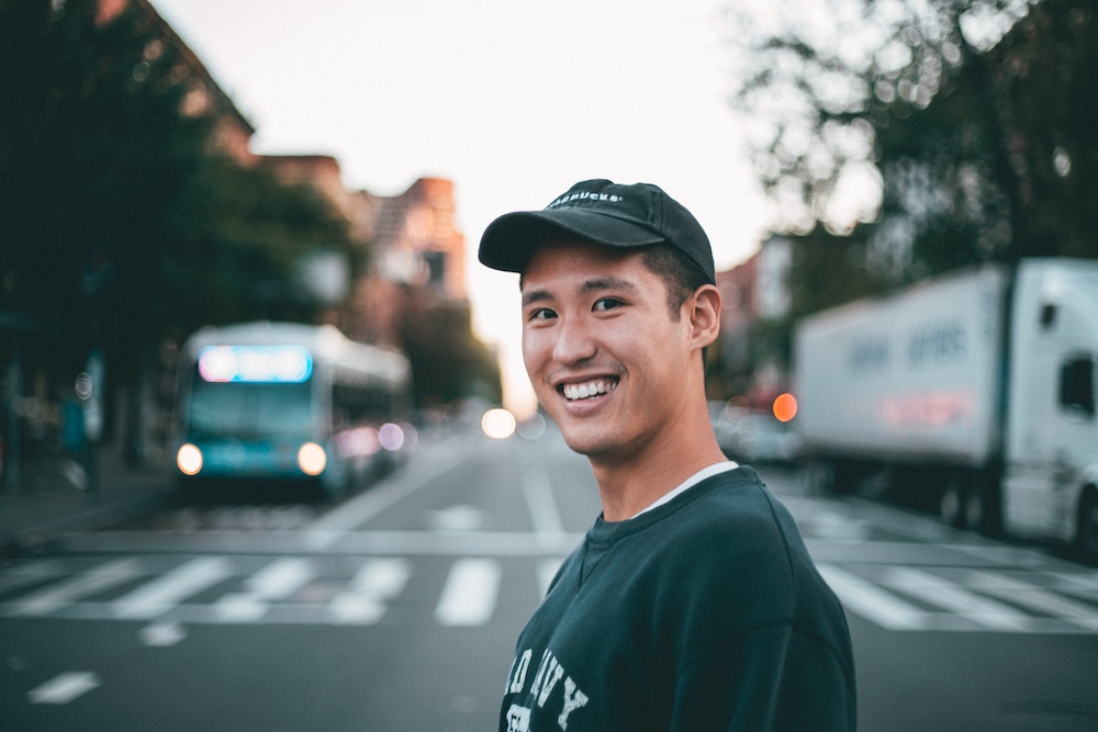 Young man on crosswalk